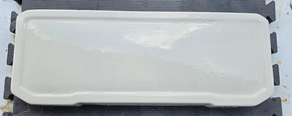 White Case Robinson toilet tank lid, top view showing actual used condition
