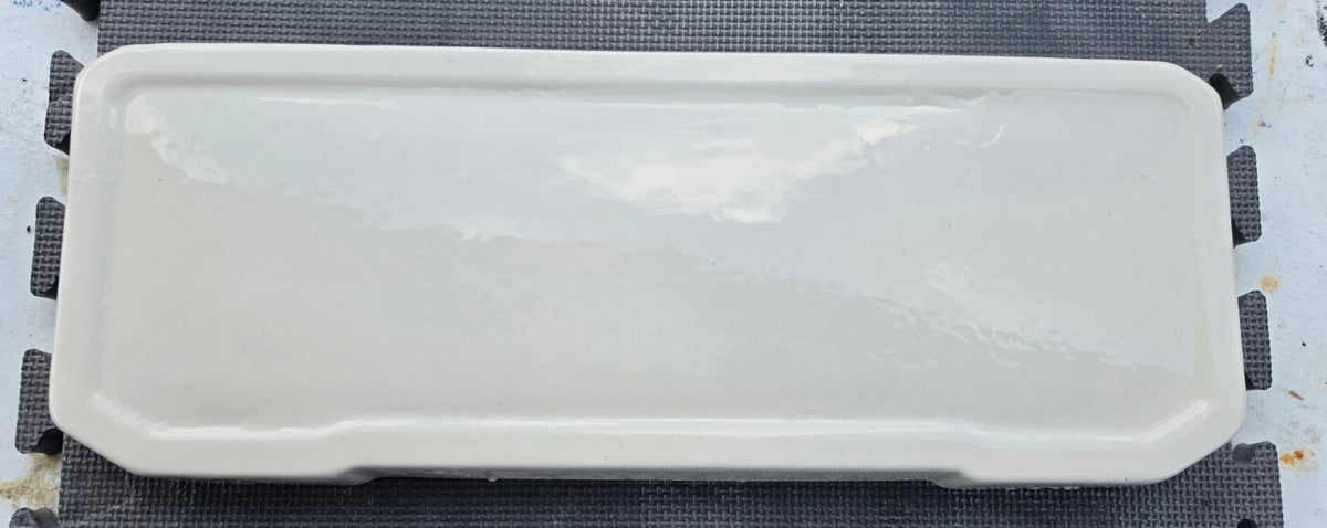 White Case Robinson toilet tank lid, top view showing actual used condition