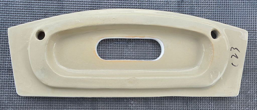 Swiss Madison TTL54 toilet tank lid underside showing rim shape and flush button opening