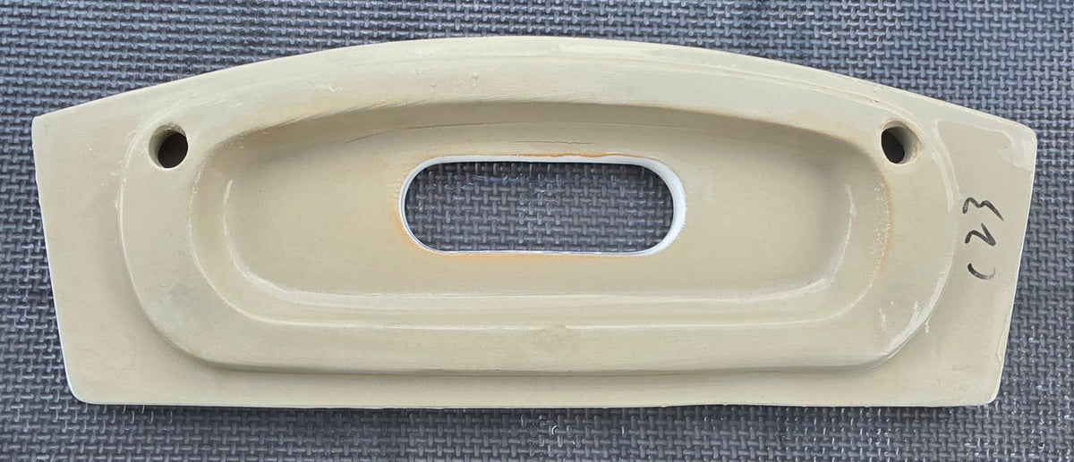 Swiss Madison TTL54 toilet tank lid underside showing rim shape and flush button opening