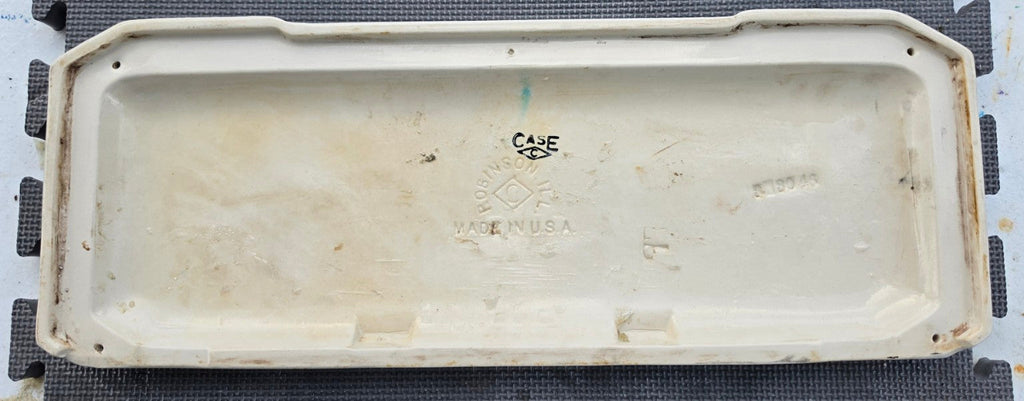 Case Robinson tank lid underside with maker markings and visible age-related wear