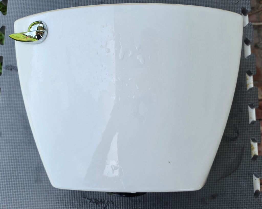 American Standard 4021 white toilet tank exterior with chrome trip lever