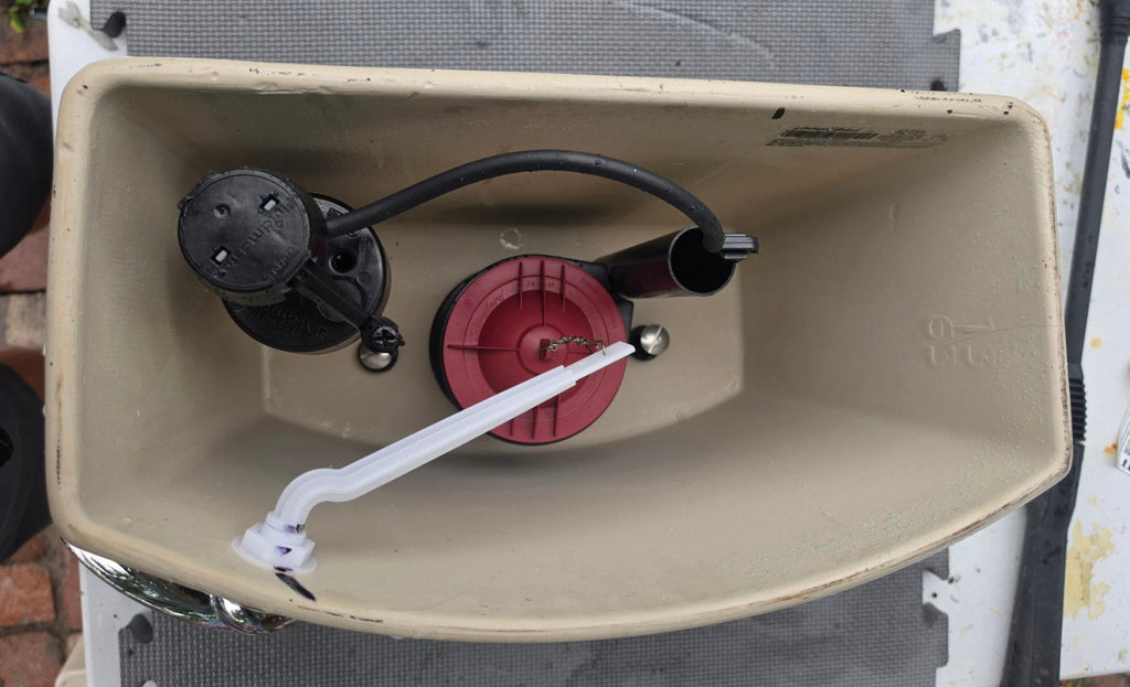 American Standard 4215A white toilet tank interior and flush components