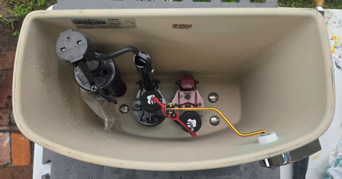 American Standard 4385A108.020 right-hand white VorMax toilet tank interior and label