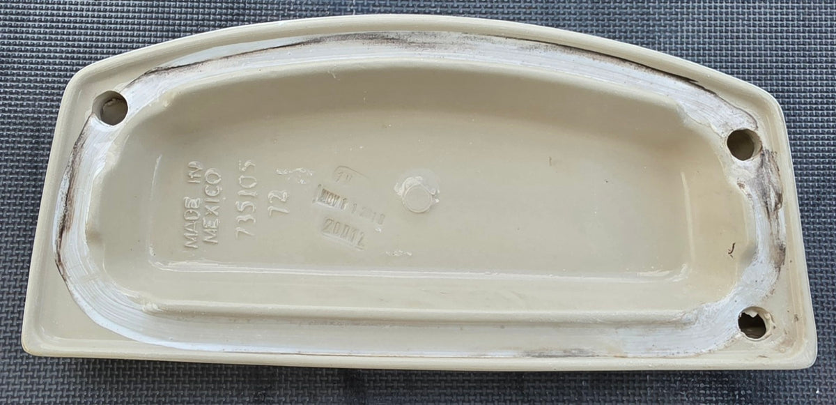 735105 OEM part number and Made in Mexico marking on American Standard lid underside