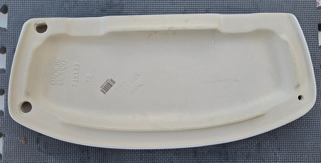 American Standard 735133 white toilet tank lid underside showing 735133 marking