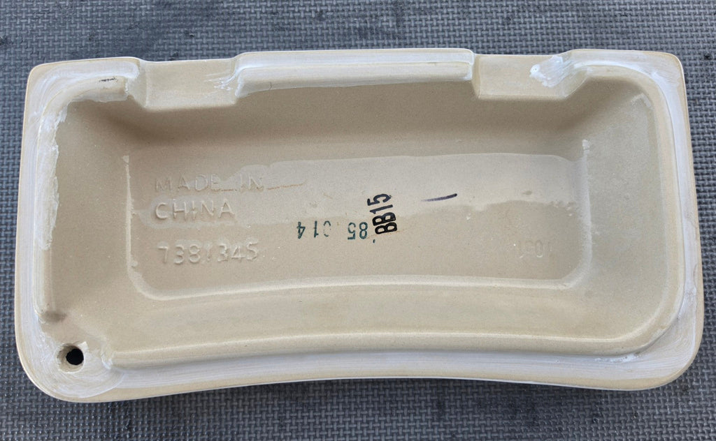 American Standard 735228 white toilet tank lid underside showing 7381345 marking