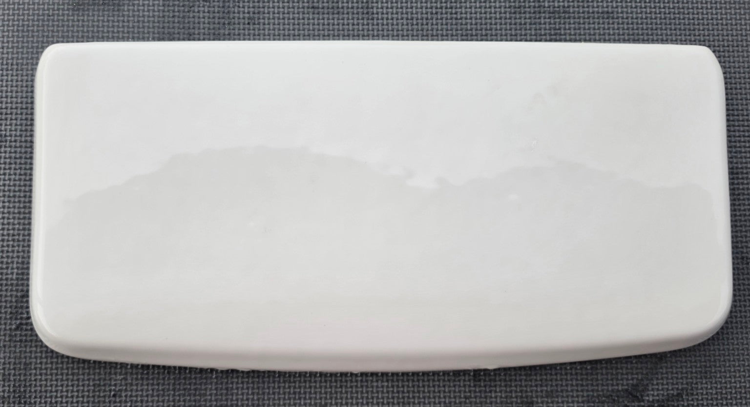 White Briggs 7470 toilet tank lid top view