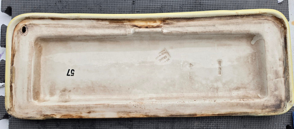 Crane Pacific Oxford Citron Yellow toilet tank lid, underside view