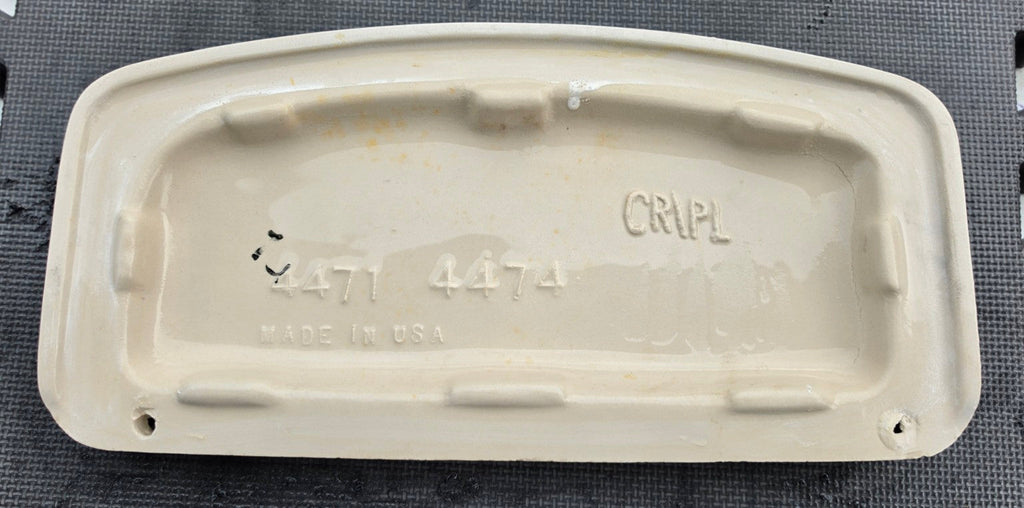 Crane Universal Rundle 4471 4474 white toilet tank lid, underside with molded part numbers