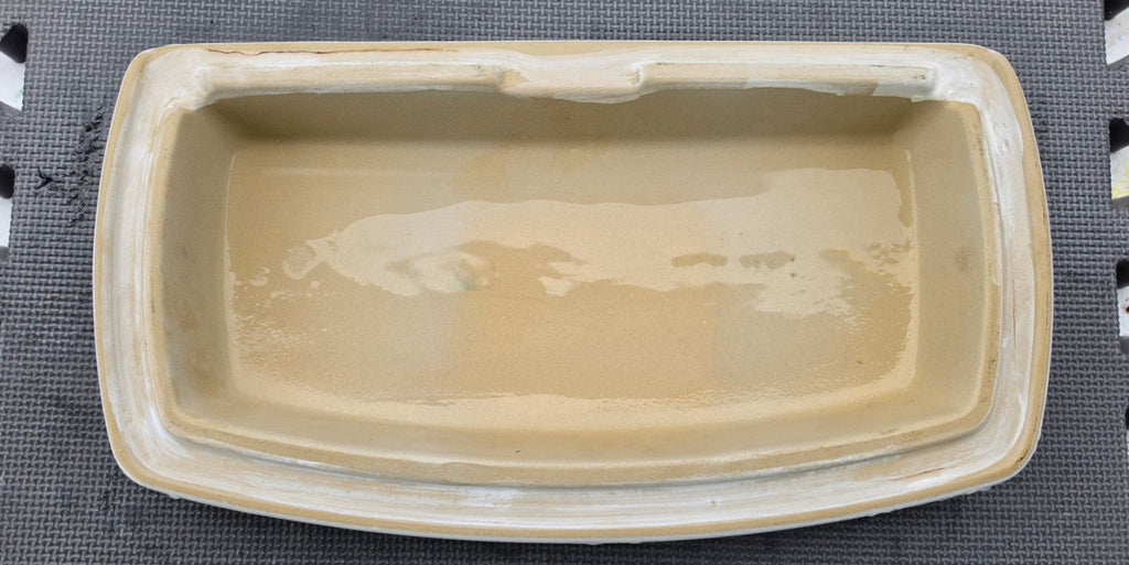 Delta RP82448 white toilet tank lid underside showing original porcelain mounting rim