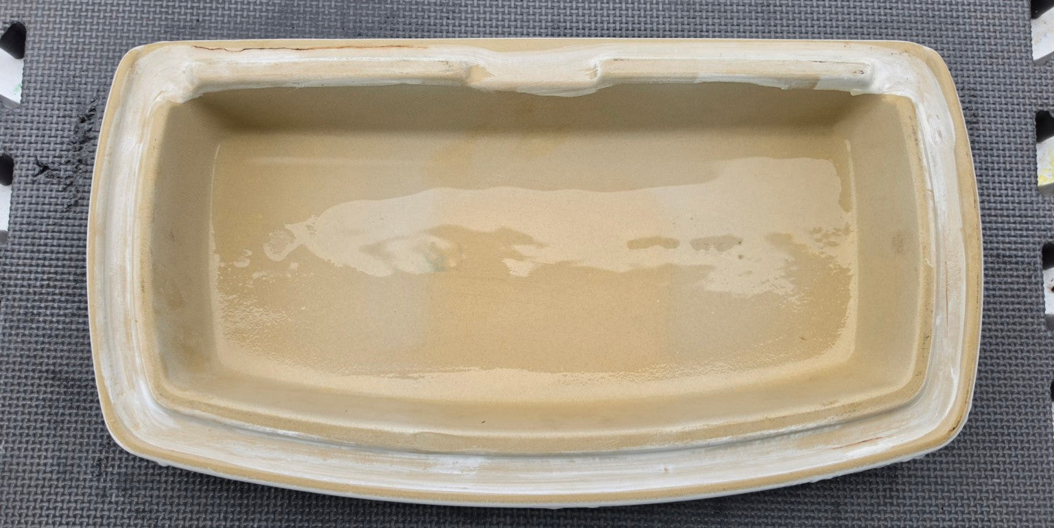 Delta RP82448 white toilet tank lid underside showing original porcelain mounting rim