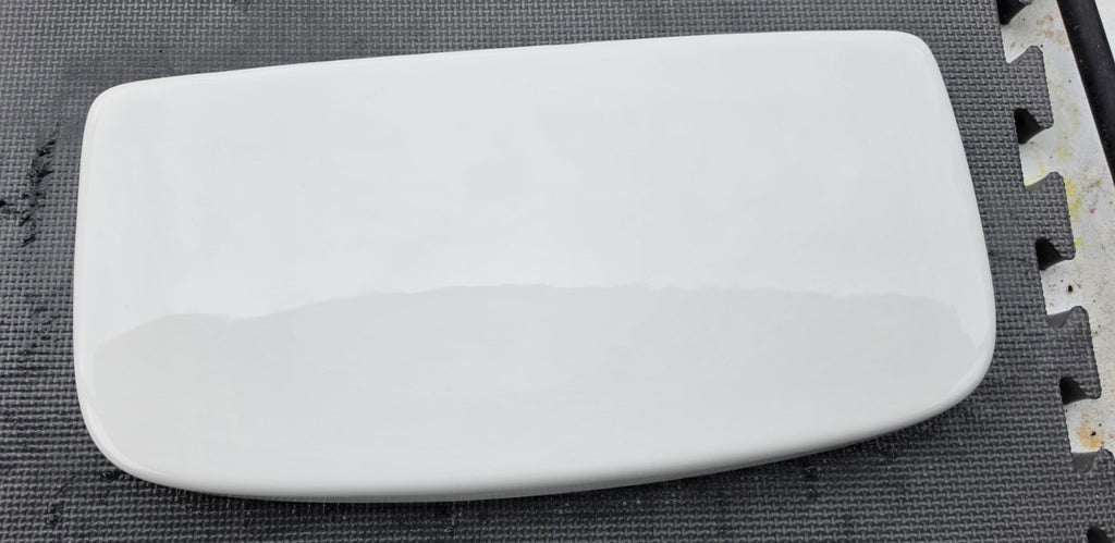 Glacier Bay 140-911 MLS10012 white toilet tank lid top view, 18.125 by 8.75 inches