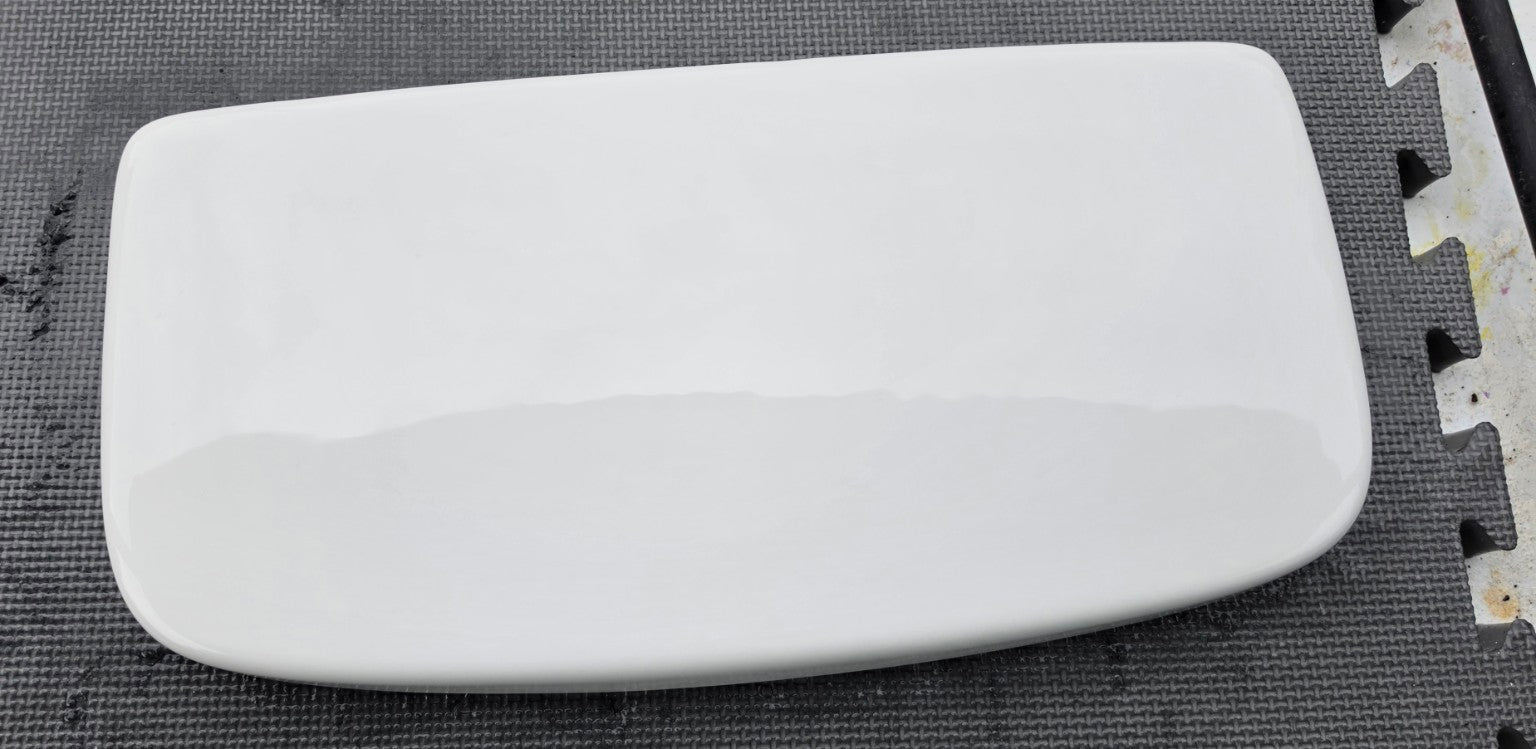Glacier Bay 140-911 MLS10012 white toilet tank lid top view, 18.125 by 8.75 inches