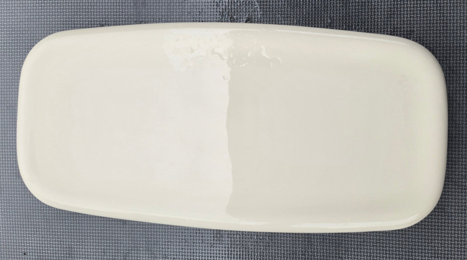 Kohler 1033723 almond toilet tank lid top view