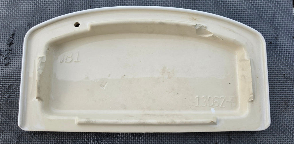 Kohler 1306245 white toilet tank lid underside showing model number