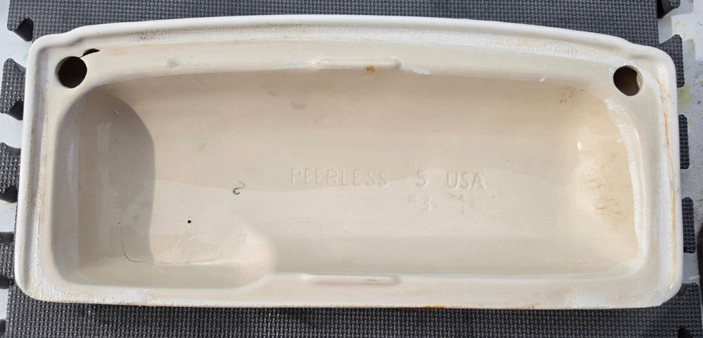 Peerless 35 white toilet tank lid underside showing Peerless USA stamp