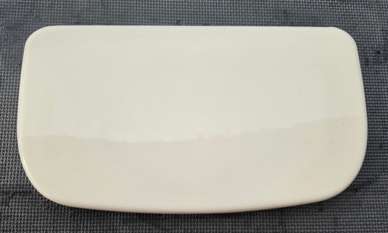 Sterling 1203861-AA toilet tank lid in Biscuit - top view