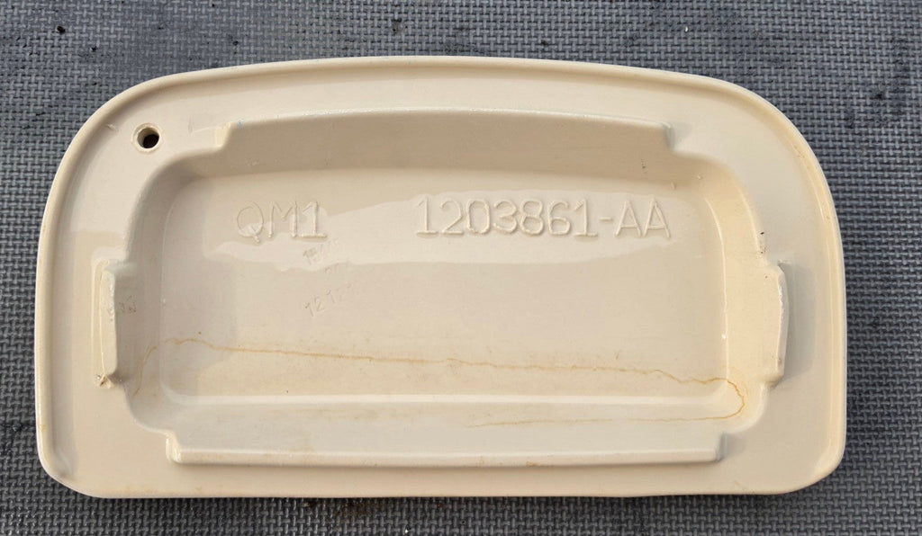 Sterling 1203861-AA white toilet tank lid underside showing model number