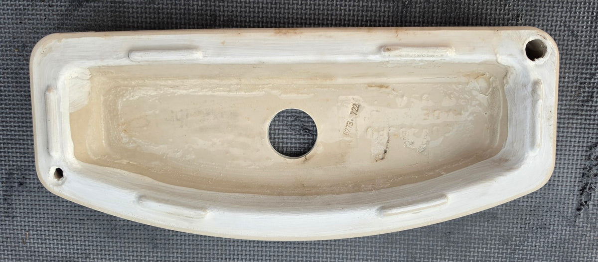 TOTO ST446EMA white toilet tank lid - underside showing ST446 marking