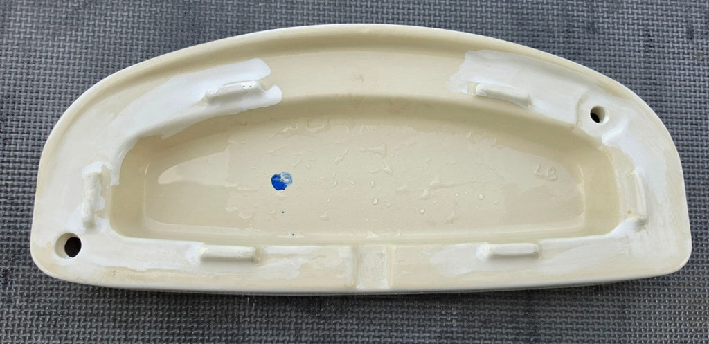 TOTO ST604 TCU604 toilet tank lid in white underside view