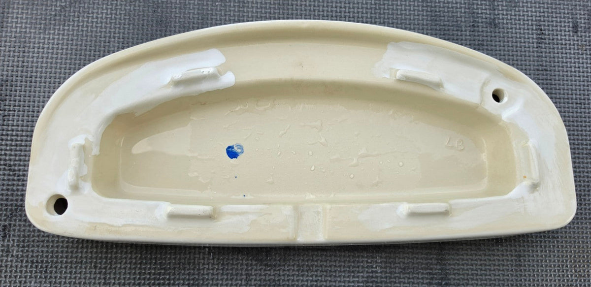 TOTO ST604 TCU604 toilet tank lid in white underside view